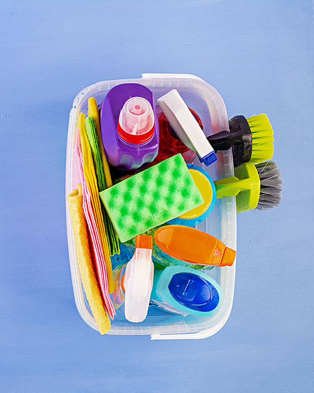 cleaning caddy full of cleaning products.