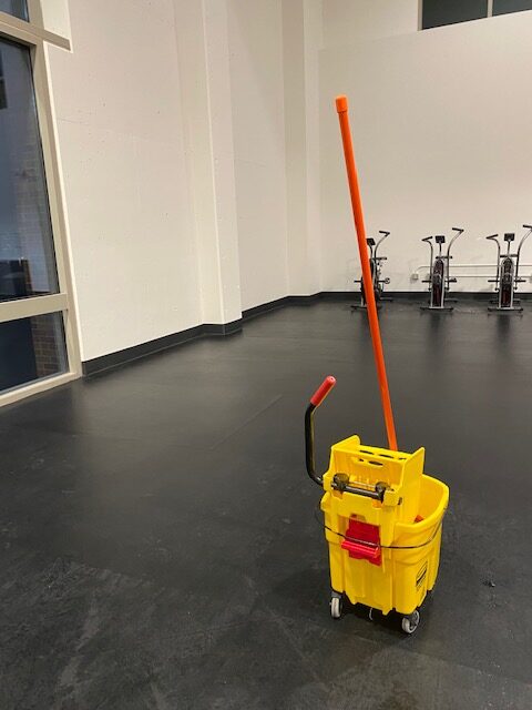 Wet mopping with warm water is all that is necessary to clean rubber flooring on a routine basis. 